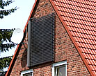Solarkollektornachrstung an der Hausfassade
